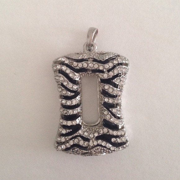 Silver with black accent pendant. - Picture 1 of 1