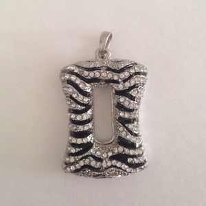 Silver with black accent pendant.