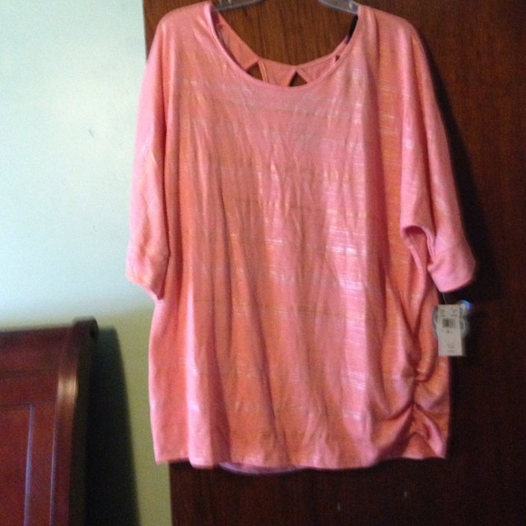 Peach colored "Going Out" shirt