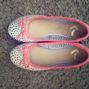 Nude flats with cut out details and neon lining