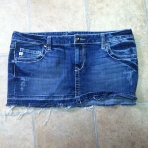 Very distressed but fun denim mini skirt!
