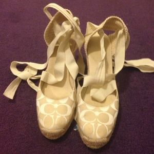 Beautiful strap up Coach shoes
