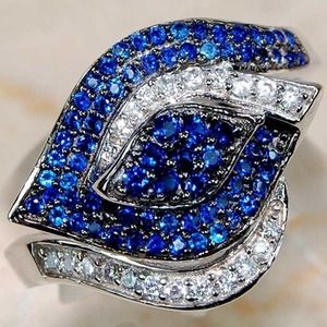 2ct blue sapphire and white topaz ring