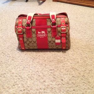 Red and tan coach duffle purse. Reduced