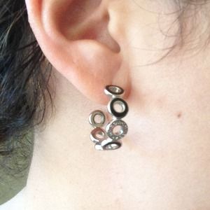 Coach enamel and stainless hoop earrings.