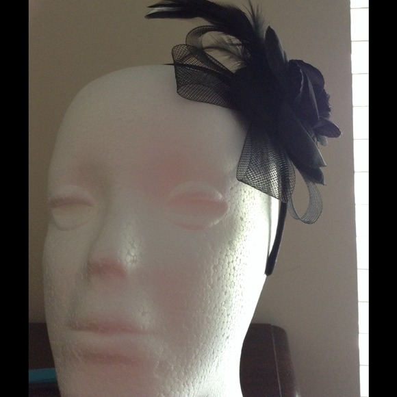 Black headband with a flower