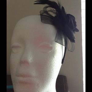 Black headband with a flower