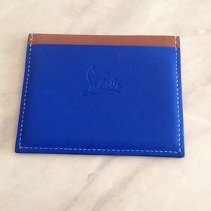 Louboutin card holder.