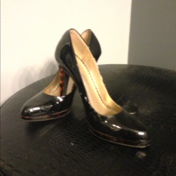 Black patent stilettos with leopard print heels