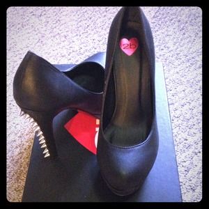 Never worn, new BEBE black high heels