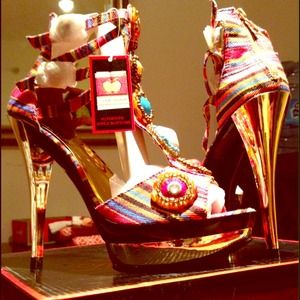 Beautiful Apple Bottoms heels. New in the box.