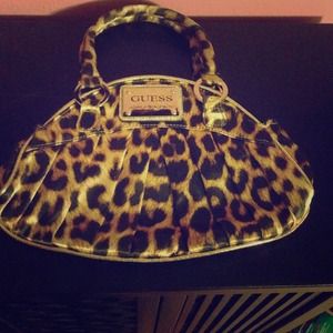 Beautiful leopard guess purse.