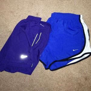 2 pairs of nike running shorts