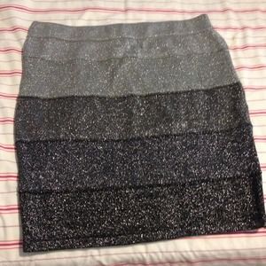A medium silver and black skirt