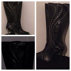 Sexy black knee high boots with designs on them