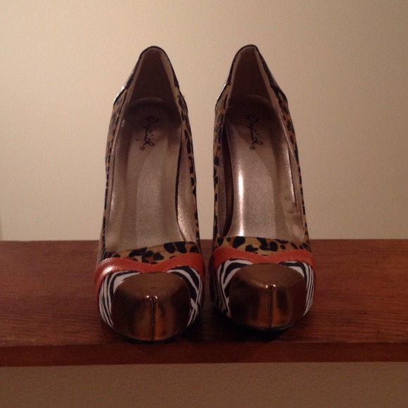 Worn just once! Cute leopard/zebra print heels.