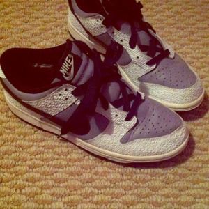 Purple & white nike shoes