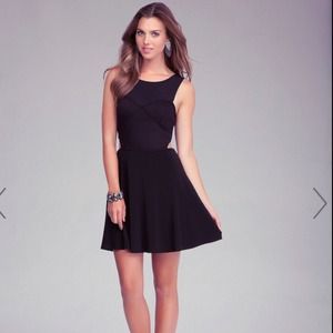 *SOLD*bebe fit and flare side cut out dress