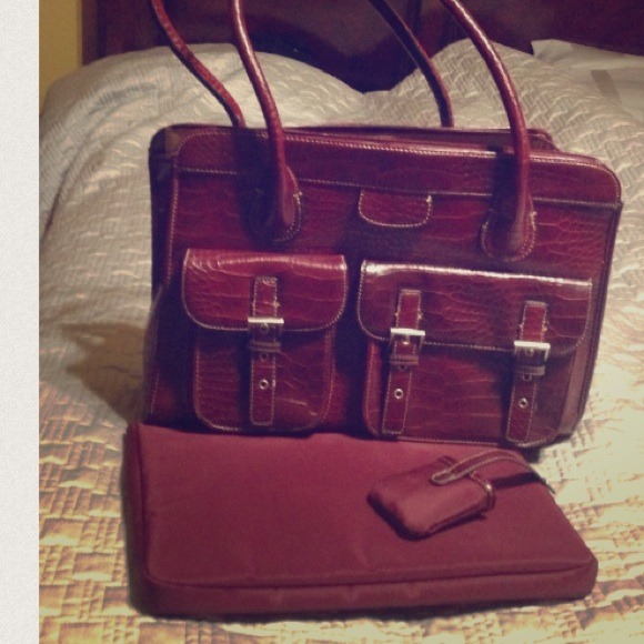 Maroon faux snake skin bag.