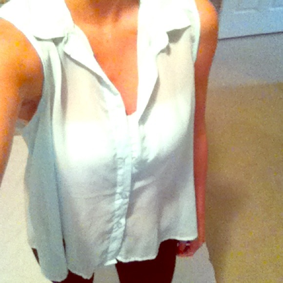 Sheer light blue sleeveless blouse