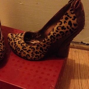 Leopard wedge shoe. The color is tan.