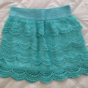 Short turquoise lace skirt