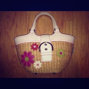 Coach straw bag w/ leather trim.