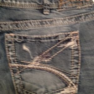 Very well worn Silver jeans size 14/L32