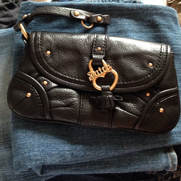 Authentic juicy couture leather wristlet. - Picture 1 of 4