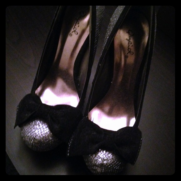 Silver and black bow