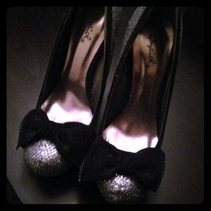 Silver and black bow