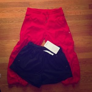 Red dance capris and black play all day short
