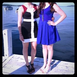 Black white and red dress on left