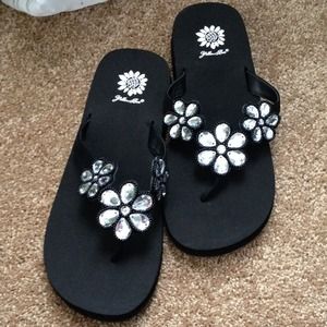 Brand new Yellow Box flip flops.