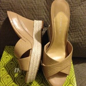 Tan, wedge, step-in shoe.