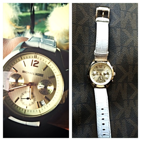 MK gold leather strap watch.
