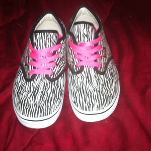 Brand new zebra print vans.