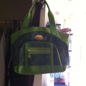 Selling a beautiful green coogi bag.