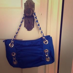 Bright blue accent bag.