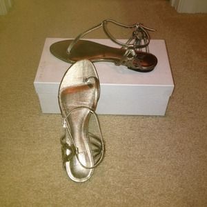 I Miller pewter flat thong sandals.