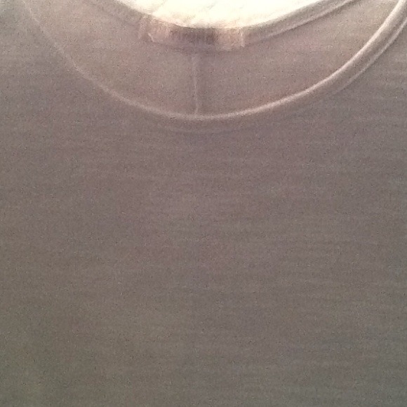 Light grey shirt.