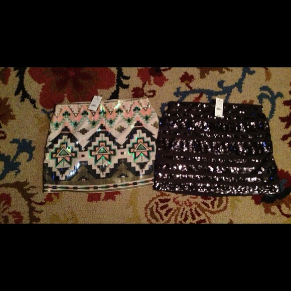 Two new with tags sequined mini skirts Express.