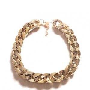 Gold chain necklace.
