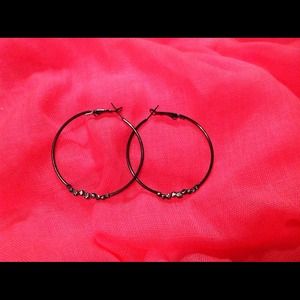 Hoop earrings with Cz detailing.