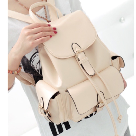 Handbags - Stylish cream buckles satchel bag