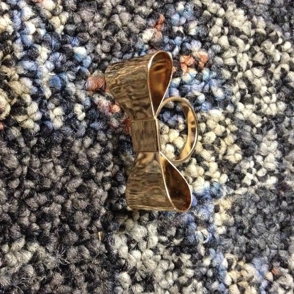 Gold bow ring.