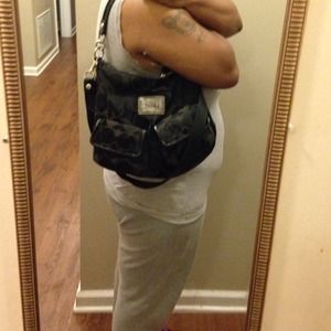 Black coach poppy Traded