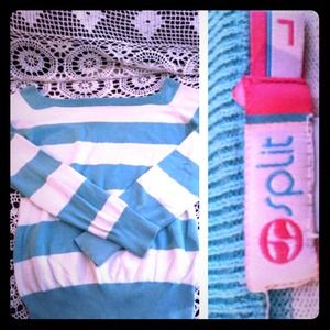 Split teal and white striped sweater