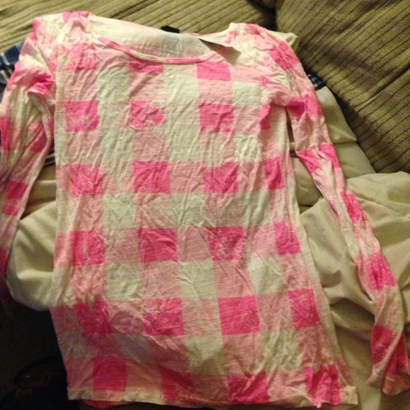 Pink and white plaid shirt.