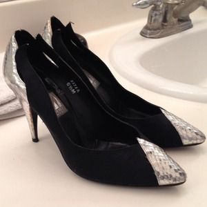Black pumps with a metallic toe. Size 6.5.